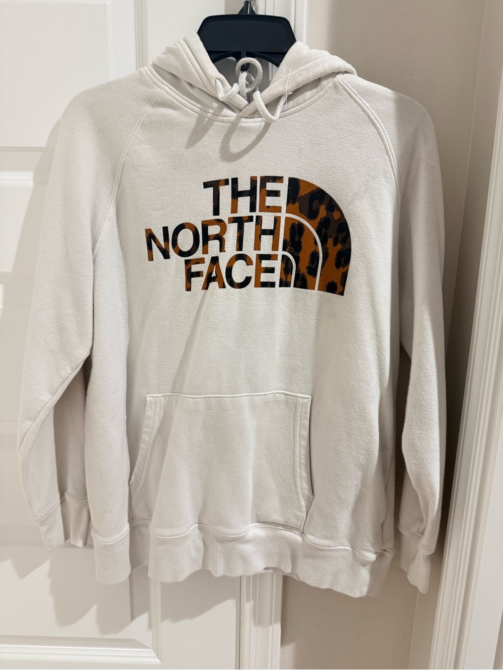The North Face Cream Crewneck Hoodie with Leopard-Print Logo